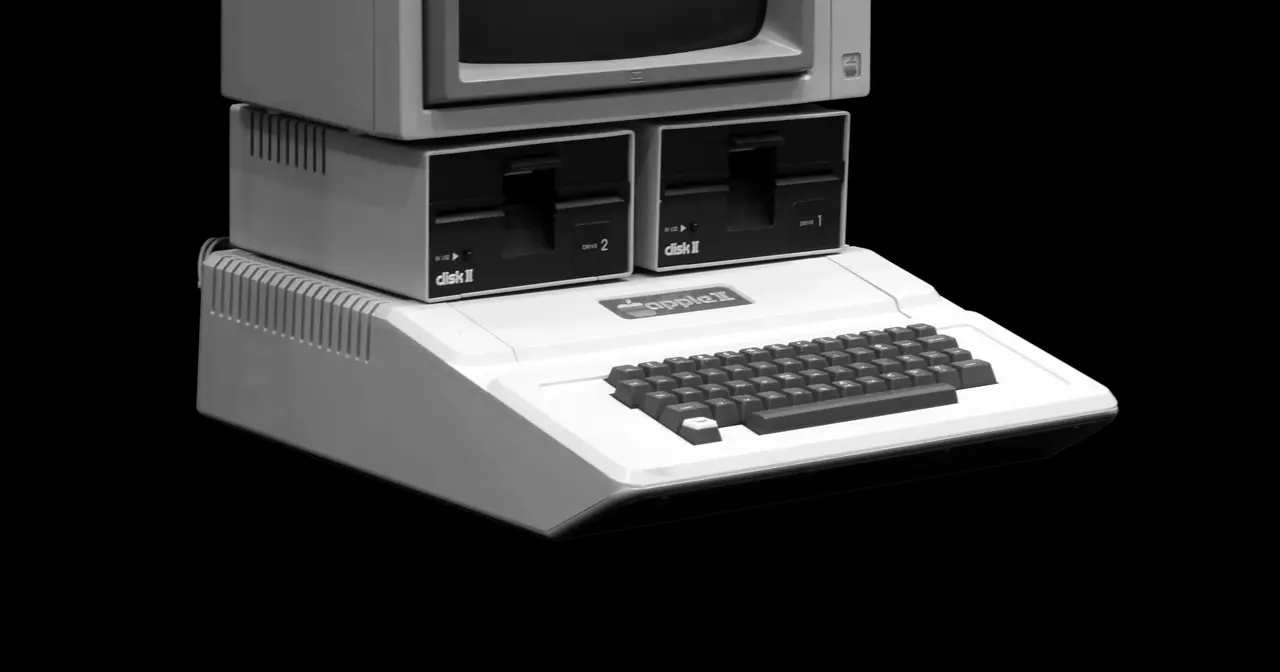 Apple II computer with monitor and two Disk II floppy drives