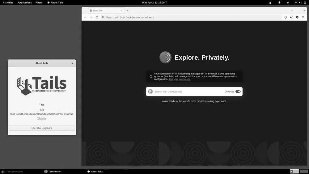 Escritorio de Tails 6.x con el menú de aplicaciones y Tor Browser